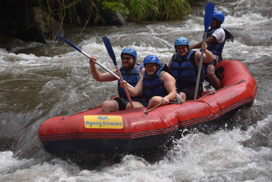 Rafting boats navigate the rapids of the Ayung River